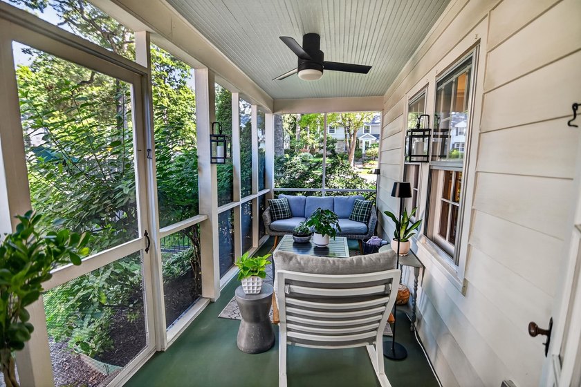 Nestled on a quiet, tree-lined street beneath a canopy of mature - photo 18