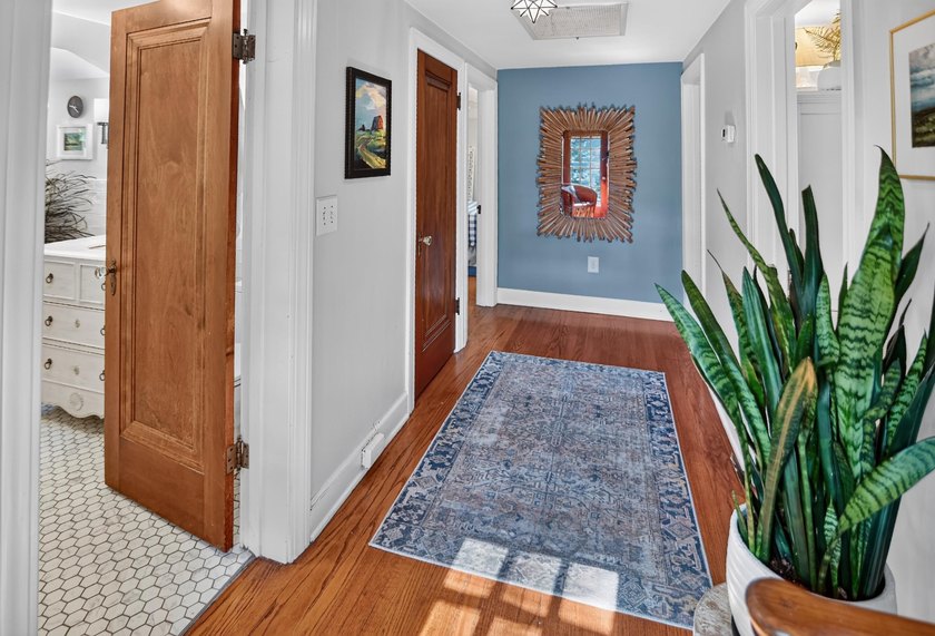 Nestled on a quiet, tree-lined street beneath a canopy of mature - photo 26