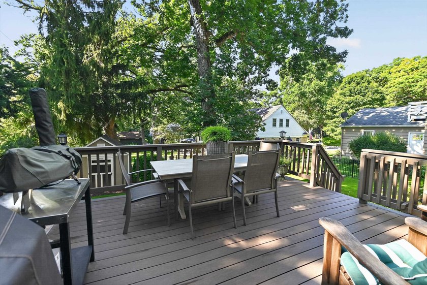 Nestled on a quiet, tree-lined street beneath a canopy of mature - photo 39