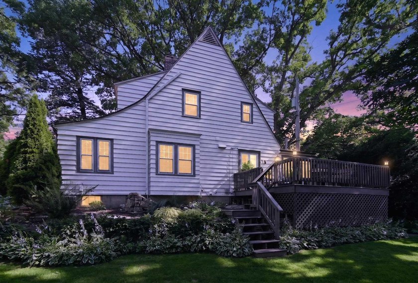 Nestled on a quiet, tree-lined street beneath a canopy of mature - photo 46