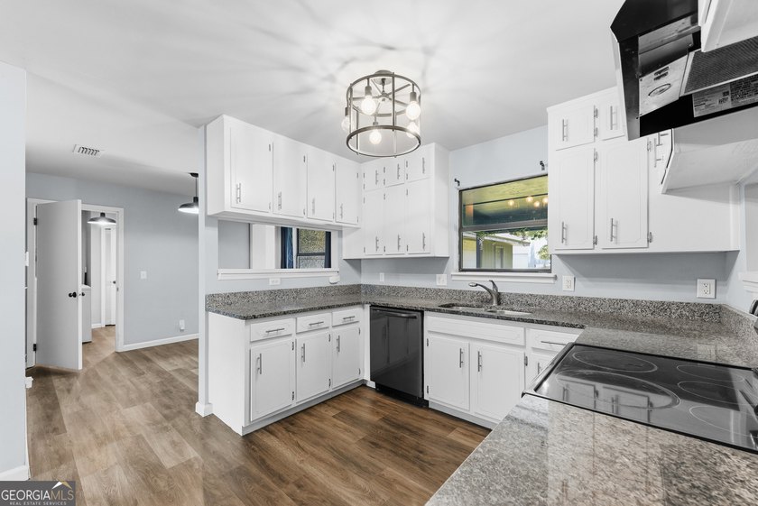 Plenty of space welcomes you in this 4/5 bedroom 2.5 bath home - photo 13