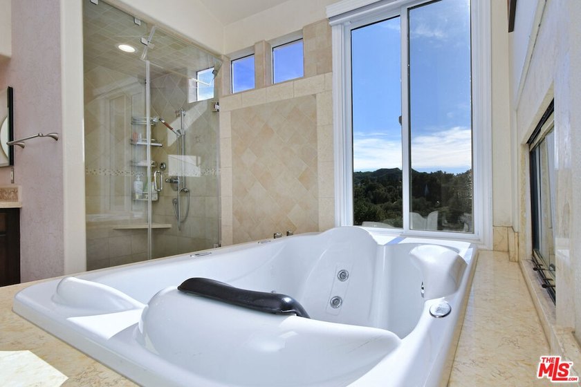 Located in the prestigious Bellagio Community, this elegant - photo 22