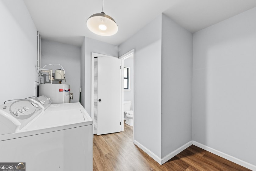 Plenty of space welcomes you in this 4/5 bedroom 2.5 bath home - photo 33