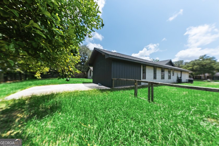 Plenty of space welcomes you in this 4/5 bedroom 2.5 bath home - photo 36