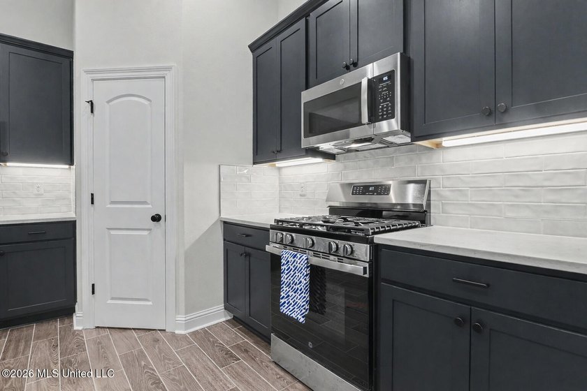 This beautiful home in the Shieldsboro community offers a - photo 13
