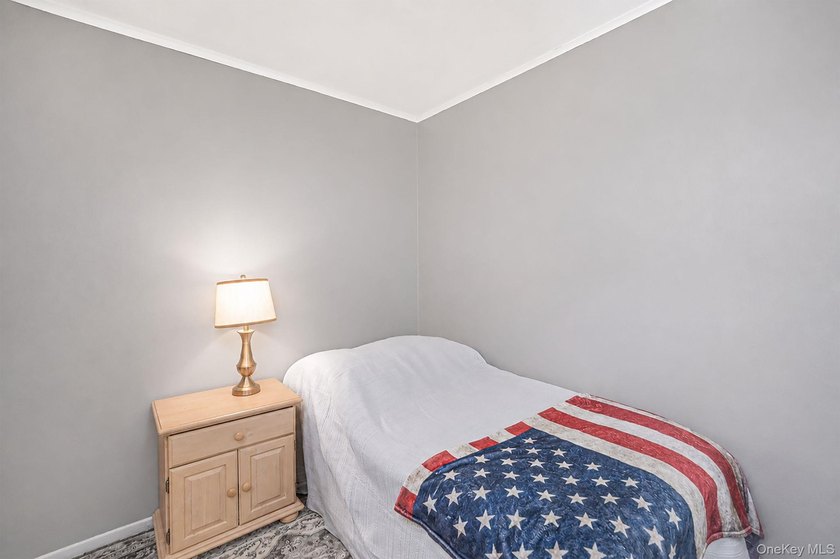 This charming classic 3-bedroom, 2-bath ranch offers comfort - photo 15