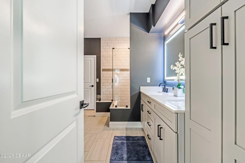 Discover a spacious contemporary home perfectly zoned for the - photo 22