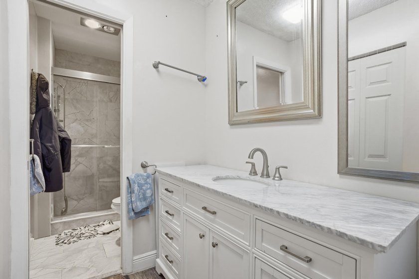 Motivated seller-Move-in ready in a desirable 55+ community! - photo 8