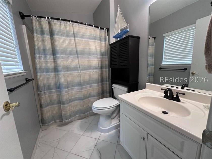 Nestled on a quite cul-de-sac, this sunny two bedroom, two bath - photo 16