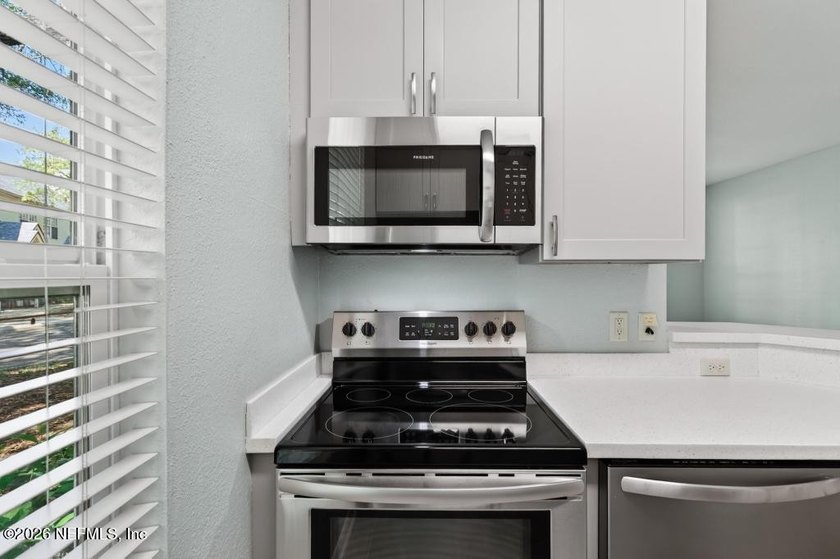 Featuring a private garage with an additional parking space - photo 36
