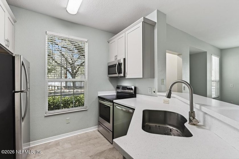 Featuring a private garage with an additional parking space - photo 38
