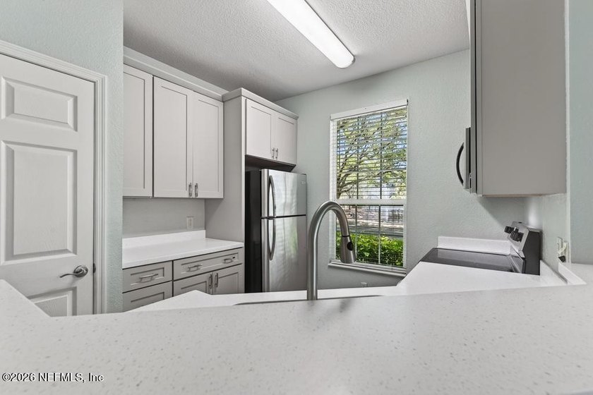 Featuring a private garage with an additional parking space - photo 42
