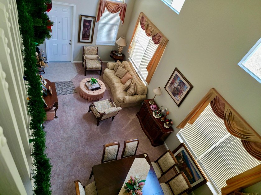 This two-story residence offers a functional 4-bedroom - photo 5