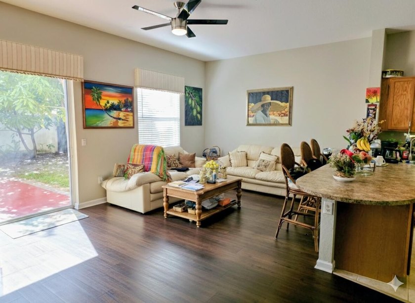 This two-story residence offers a functional 4-bedroom - photo 7