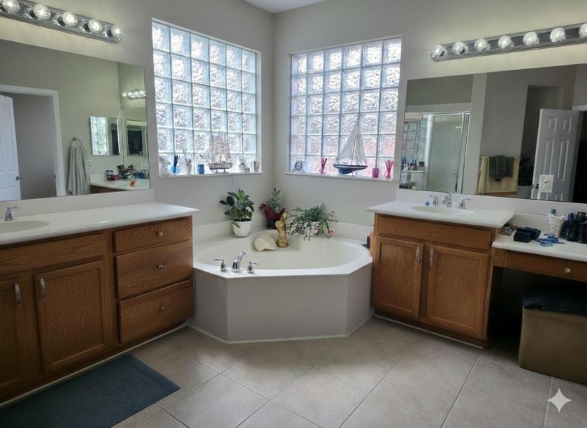 This two-story residence offers a functional 4-bedroom - photo 9