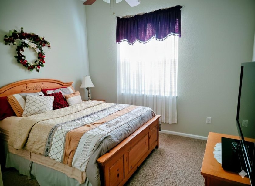 This two-story residence offers a functional 4-bedroom - photo 10