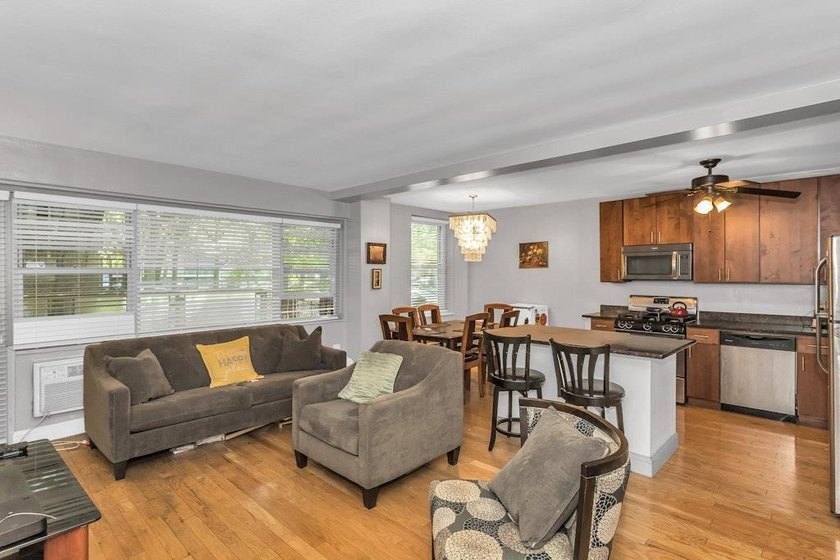 Discover modern living in this stylish two-bedroom, one and a - photo 3