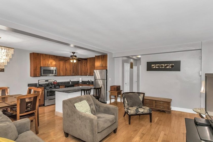 Discover modern living in this stylish two-bedroom, one and a - photo 4
