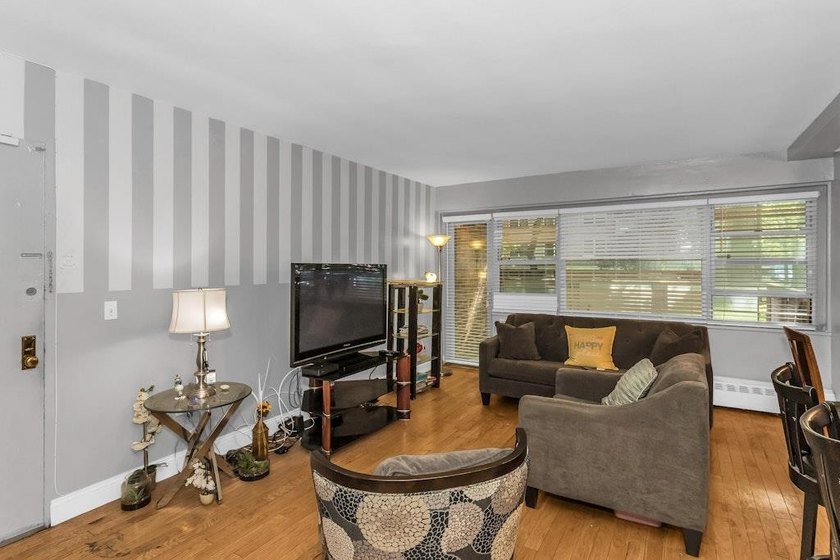 Discover modern living in this stylish two-bedroom, one and a - photo 5