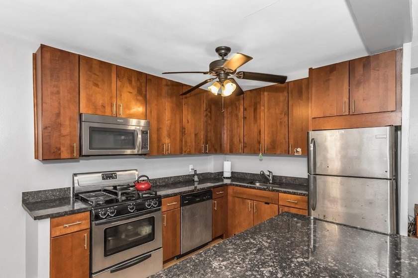 Discover modern living in this stylish two-bedroom, one and a - photo 8
