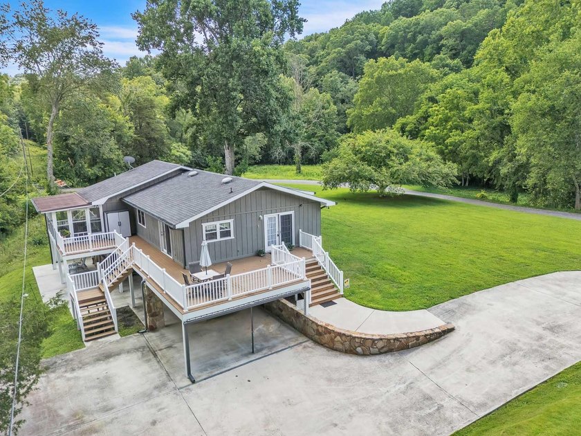 Country Living at Its Best on 4.1 Acres! Welcome to 1042 Big - photo 6