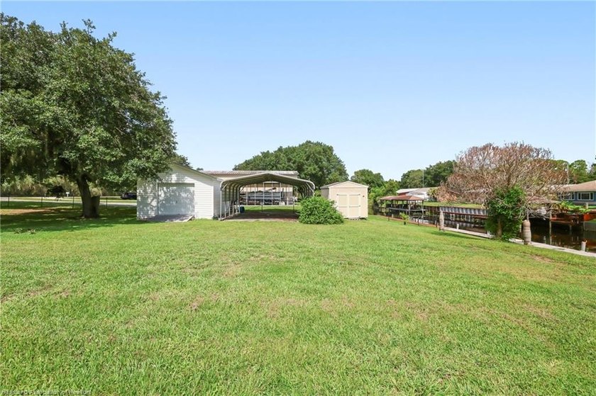 WATERFRONT HOME on almost 1/2 acre. Dock with boathouse and lift - photo 27