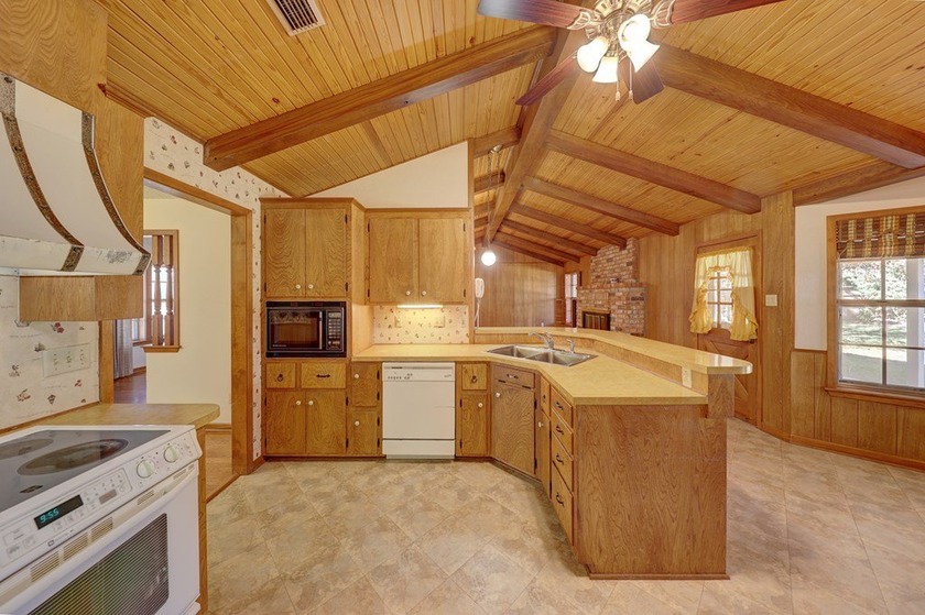 This beautifully crafted custom home sits on a large corner lot - photo 7