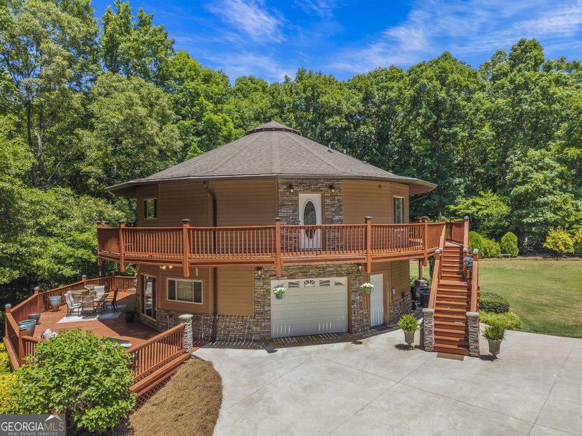 Tucked away on 5.38 peaceful acres, you'll find The LODGE at - photo 2