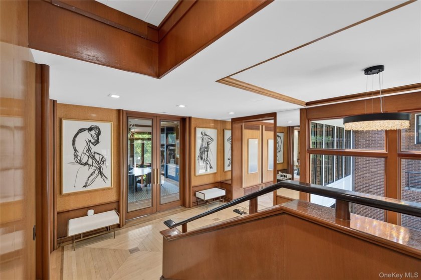 Perched above Oyster Bay Harbor on 4.04 private acres in the - photo 13