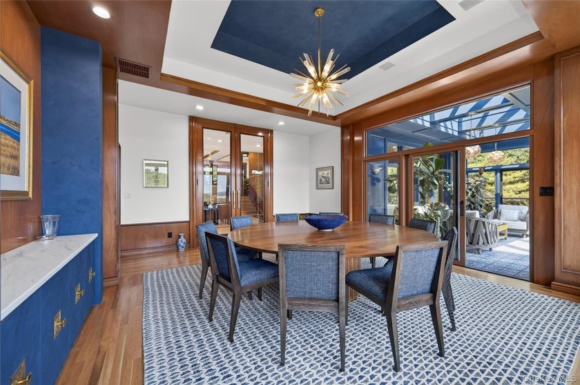 Perched above Oyster Bay Harbor on 4.04 private acres in the - photo 15