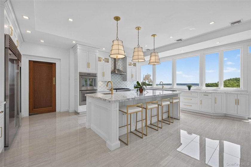Perched above Oyster Bay Harbor on 4.04 private acres in the - photo 17