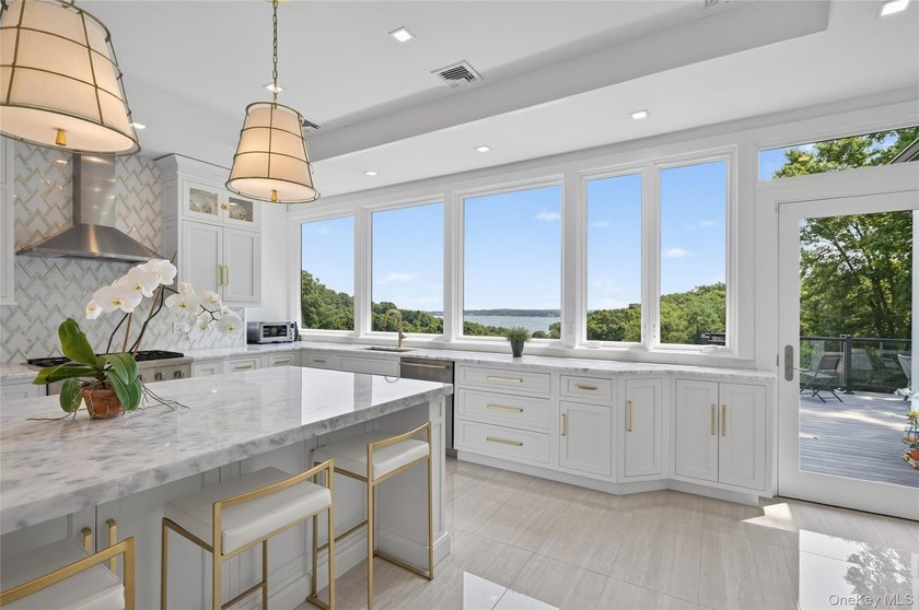 Perched above Oyster Bay Harbor on 4.04 private acres in the - photo 18