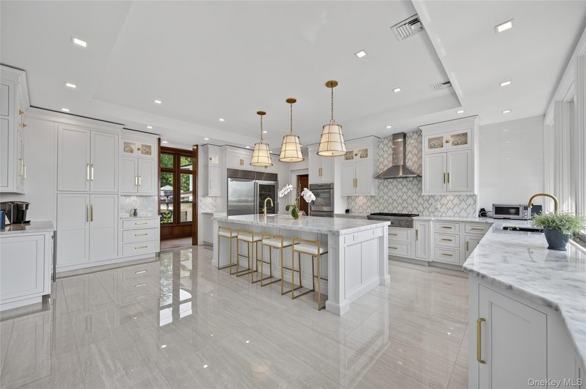 Perched above Oyster Bay Harbor on 4.04 private acres in the - photo 20