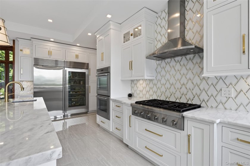 Perched above Oyster Bay Harbor on 4.04 private acres in the - photo 21