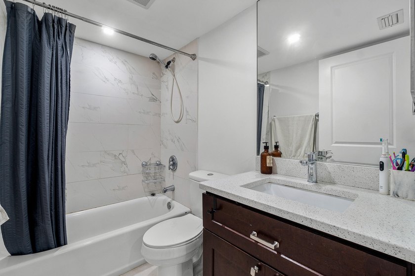 Beautifully renovated 2-bedroom, 2-bath end-unit condo in the - photo 21