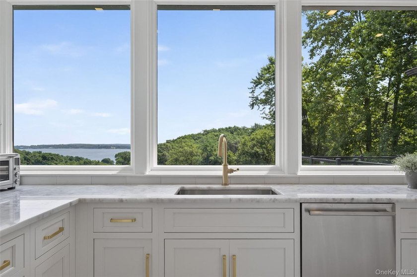 Perched above Oyster Bay Harbor on 4.04 private acres in the - photo 22