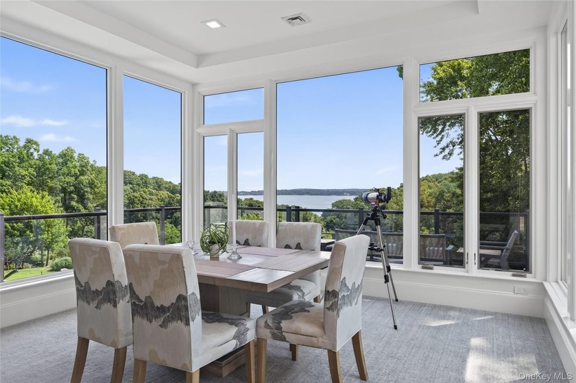 Perched above Oyster Bay Harbor on 4.04 private acres in the - photo 26