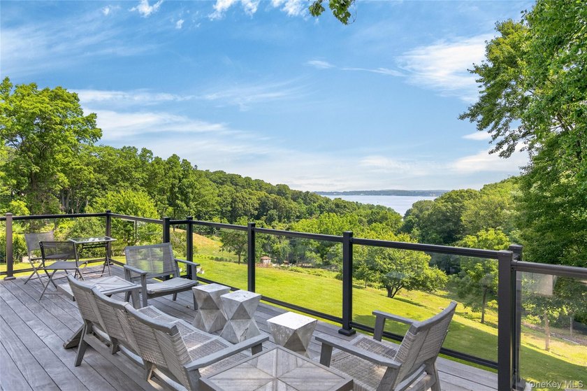 Perched above Oyster Bay Harbor on 4.04 private acres in the - photo 27