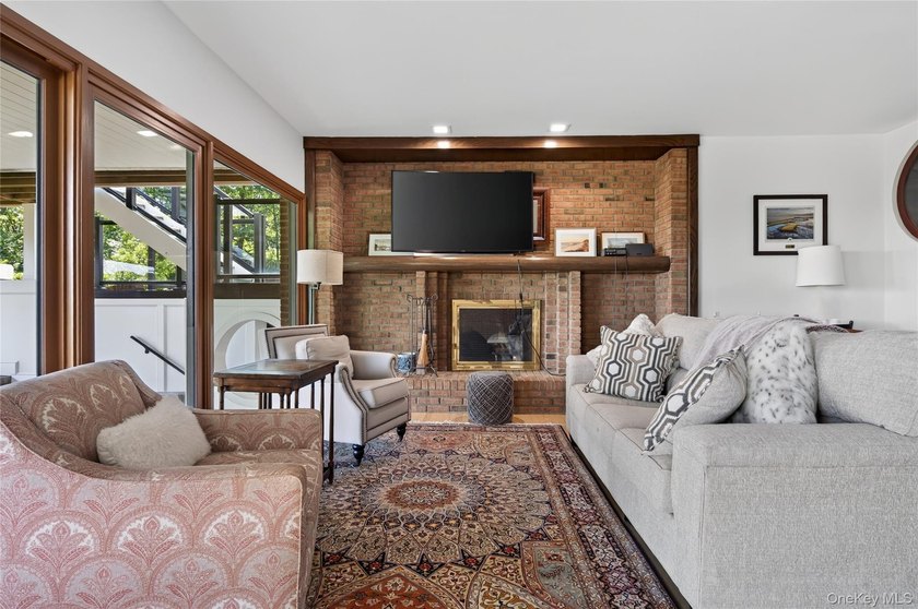 Perched above Oyster Bay Harbor on 4.04 private acres in the - photo 29