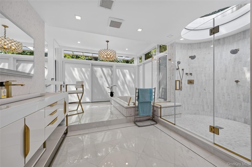 Perched above Oyster Bay Harbor on 4.04 private acres in the - photo 34