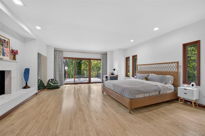 Perched above Oyster Bay Harbor on 4.04 private acres in the - photo 40