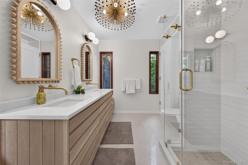 Perched above Oyster Bay Harbor on 4.04 private acres in the - photo 41