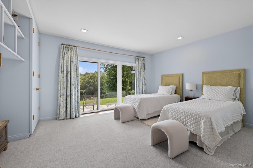 Perched above Oyster Bay Harbor on 4.04 private acres in the - photo 44