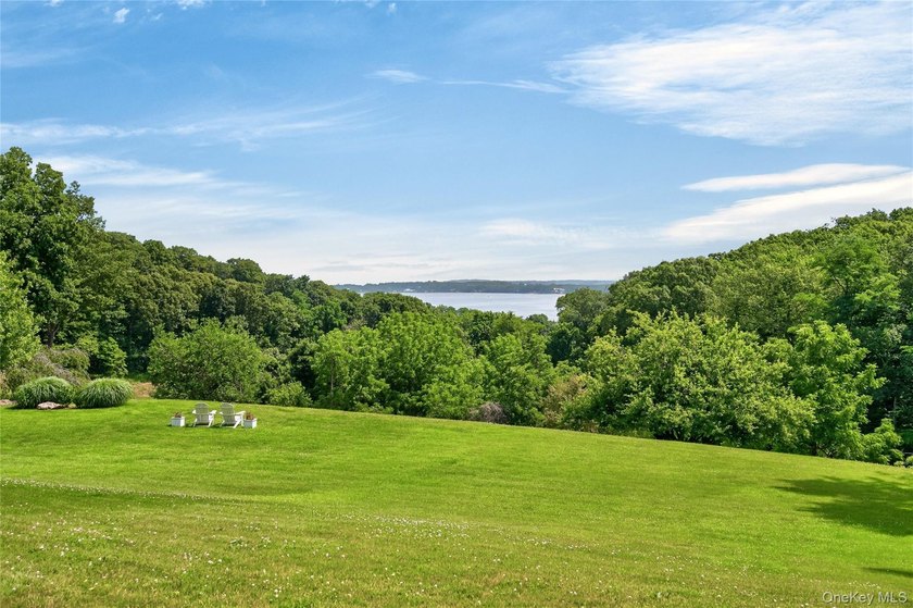 Perched above Oyster Bay Harbor on 4.04 private acres in the - photo 48