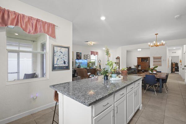 Welcome to this inviting 3-bedroom, 2-bathroom single-story home - photo 12