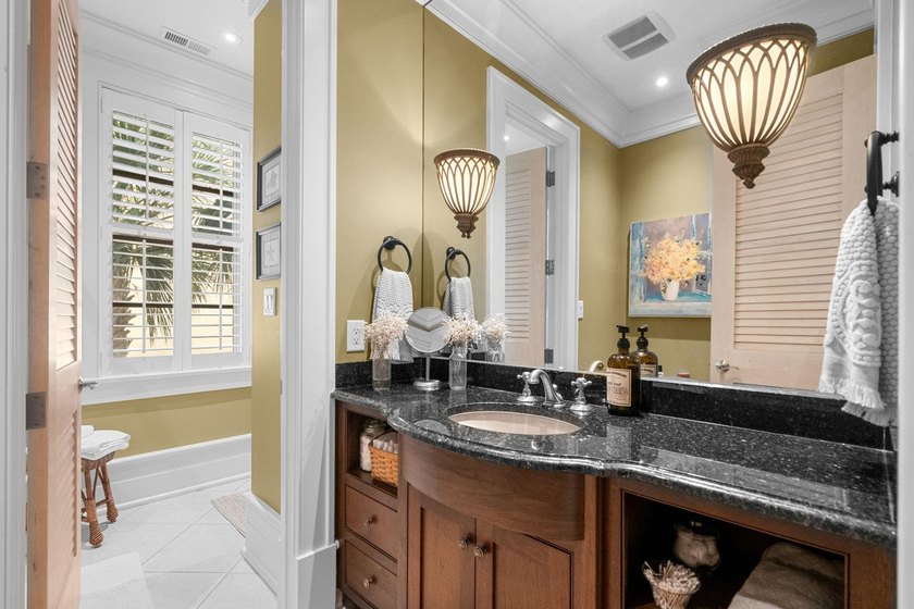 Welcome to an extraordinary oceanfront estate nestled behind - photo 28