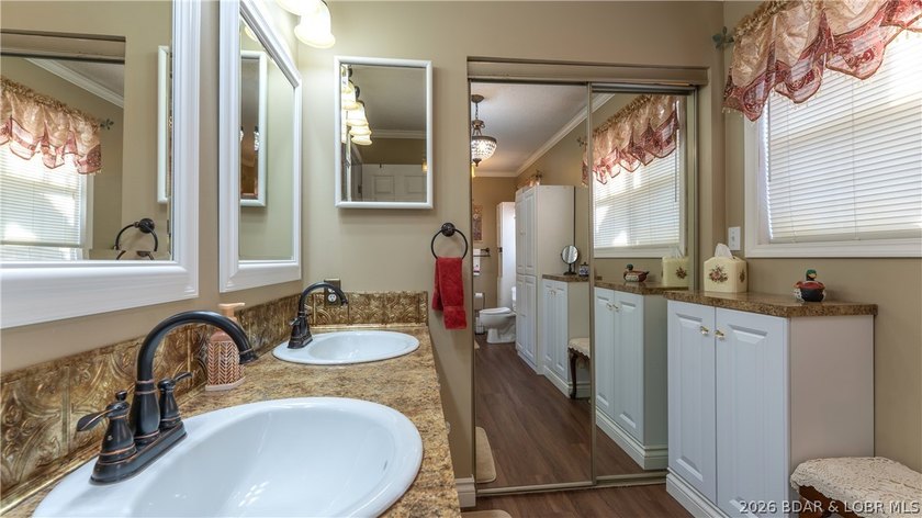 Darling lakefront GEM, cherished by one family for years is now - photo 27