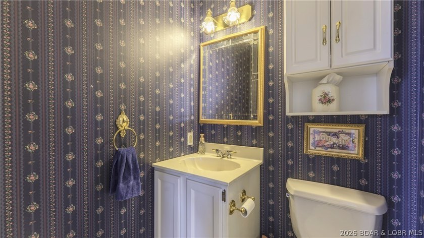 Darling lakefront GEM, cherished by one family for years is now - photo 30
