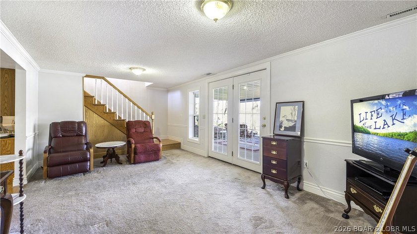 Darling lakefront GEM, cherished by one family for years is now - photo 31