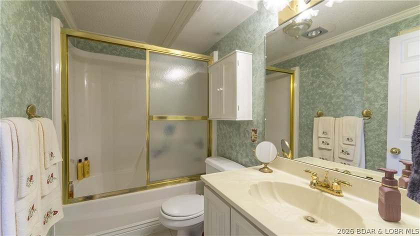Darling lakefront GEM, cherished by one family for years is now - photo 36